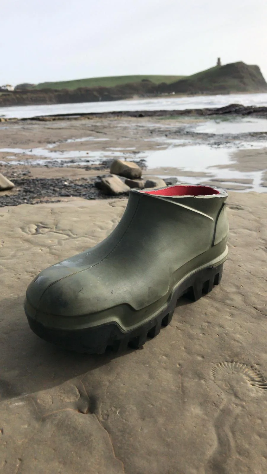 Dorset fossil light house welly green welly Kimmeridge Bay lonely shoe. lonely sea fever shoe jpg | Lonely shoes